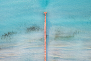 WOODEN PIER ON THE BEACH