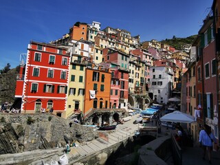 Riomaggiore, Cinque Terre National Park, Liguria, Italy.
View of the colorful houses along the coastline of Cinque Terre area in Riomaggiore, Liguria, Italy.
Town of Riomaggiore, Liguria, Italy.