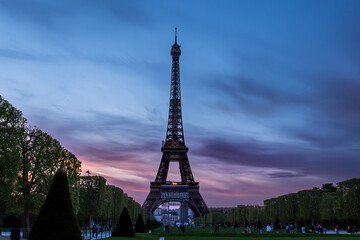 Eiffel Tower silhouette sunset beginning of Paris lights