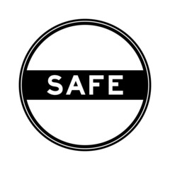 Black color round seal sticker in word safe on white background