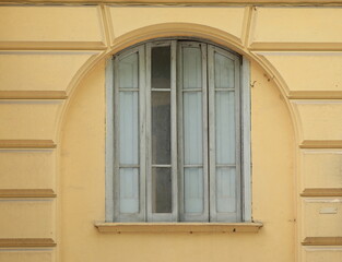 Old Yellow House Facade Detail with Window in a Rural Village in Central Italy