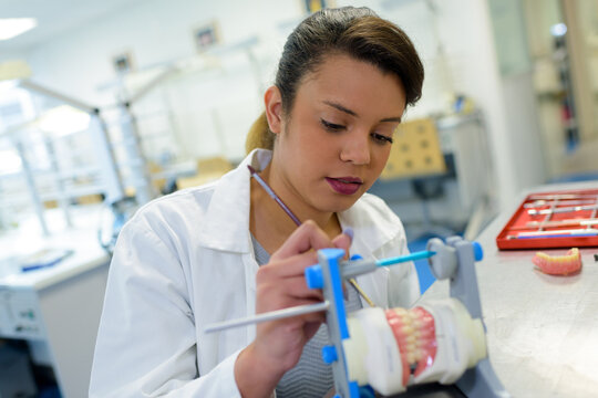 dental technician working on prosthesis