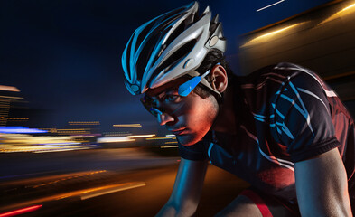 Spost background with copyspace. Cyclist. Dramatic colorful close-up portrait.	