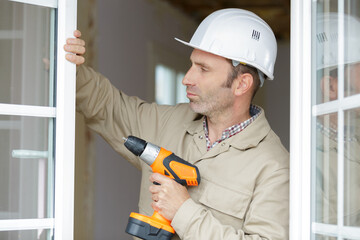 close up of a man working with drill