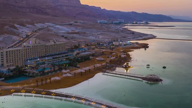 Dead sea hotels area day to night hyperlapse time lapse, Israel, 4k aerial drone