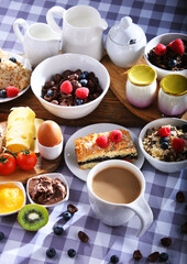 Breakfast served with coffee, juice, croissants and fruits