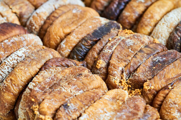 Organic dried figs close-up as vegetarian food background
