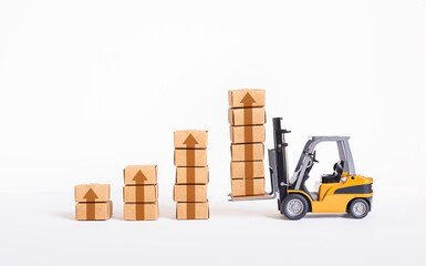 Industry and business growth with forklift loading product box.economy with demand and supply concepts.