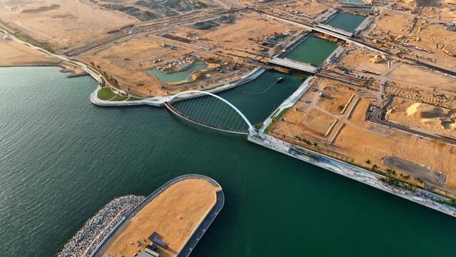 Aerial Tilt Down Shot Of People At Famous Port City Bridge, Drone Flying Forward Over Sea - Colombo, Sri Lanka
