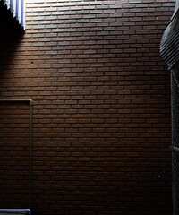 Brick wall with sunlight shaded on the surface, soft and selective focus.