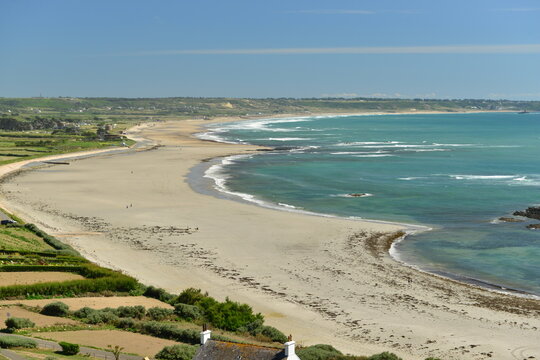 St Ouen’s Bay, Jersey,U.K. Beautiful natural beach in the Summer with Rocco tower.