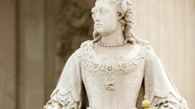 Close-up view of Queen Victoria Statue at St Paul's Cathedral in London, the masterpiece of Sir Christopher Wren, completed in 1710