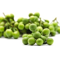 Fresh green eggplant isolated on white background. It may call in diference name Solanum torvum, the turkey berry, devil's fig, pea eggplant, platebrush or susumber. Spot focus.