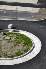 Aerial view of new roundabout and parking construction site.