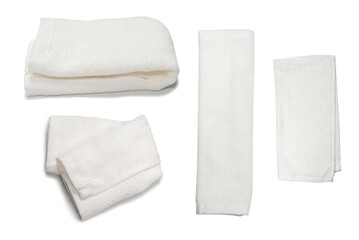 White fluffy cotton towel isolated on a white background.