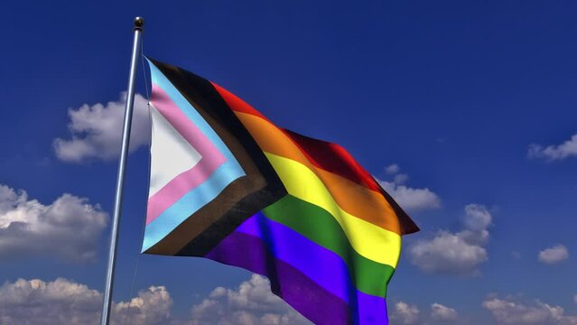 Pride Progress Flag waving in blue skies