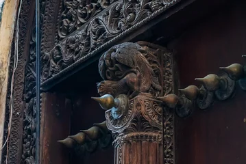 Rolgordijnen Close up of elements on antique Indian style Wooden Door in Stone Town, Zanzibar, Tanzania © garrykillian
