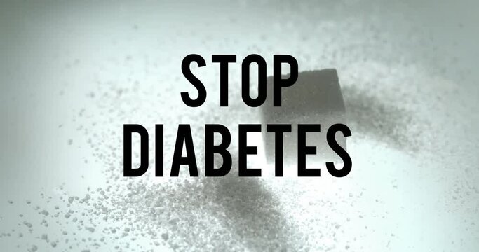 Animation of stop diabetes text over cube of sugar