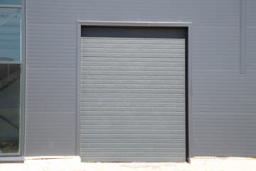 Fototapeta na wymiar Garage doors. Roller shutters.Garage roll-up gates.Protection. Doors and windows.