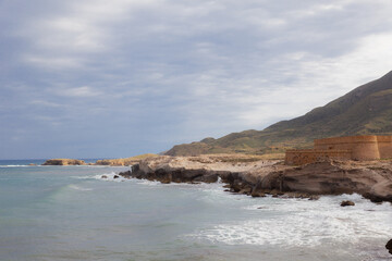waves breaking on cliffs of san felipe artillery battery