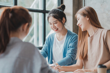 Groups of people gathered in the conference room, they were having a brainstorming meeting and planning meetings to manage the company's growth and profit. Management concept from the new generation.