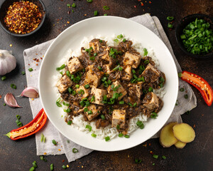Vegan Mapo tofu with mushroom and rice. Asian, Chinese food