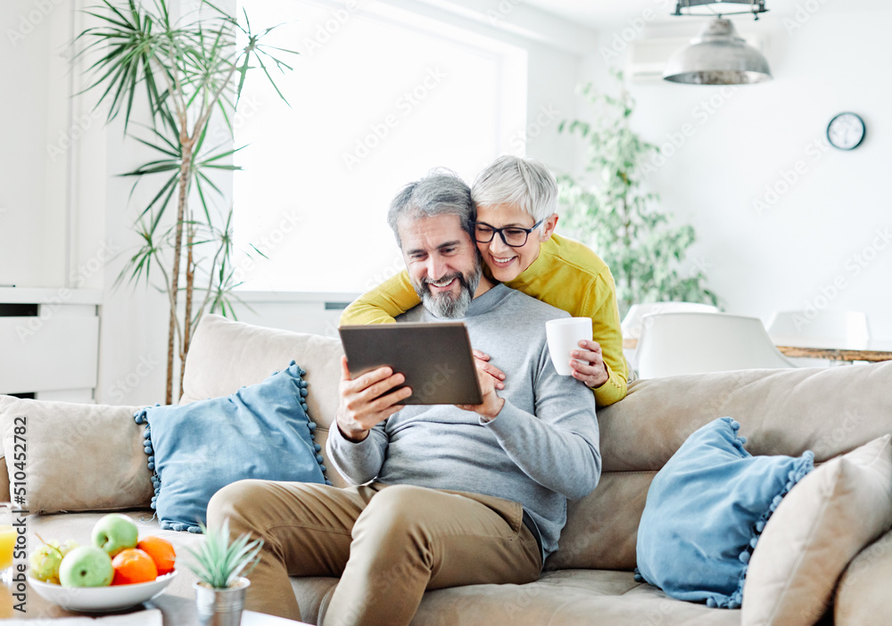 Wall mural senior couple happy tablet computer love together