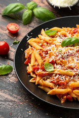 JackFruit pasta with garlic, olives, capers, tomato and cheese. Healthy vegan, diet food