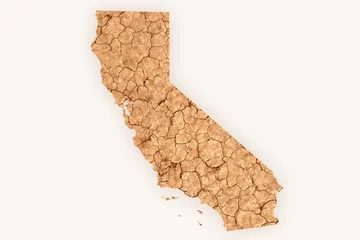 Fotobehang Dry cracked soil in the shape of drought stricken California © Jason Busa