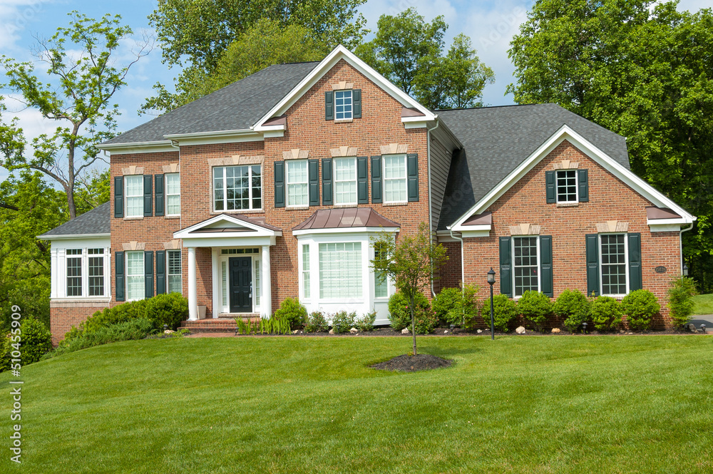 Wall mural gorgeous landscape with a single family house with a lawn. house in the suburbs of leesburg in the u