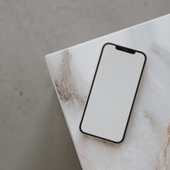 Flatlay mobile phone on marble table. Aesthetic elegant blog, online shopping, online store, social...
