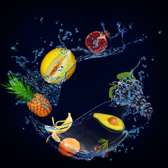 Obraz na płótnie Canvas Panorama, wallpaper with fruits in the water - fresh pomegranate, melon, grapes, banana, avocado, orange are full of vitamins for the diet