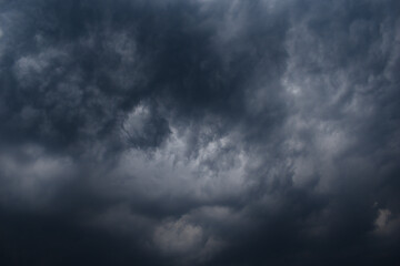 Dark rainy thunderstorm clouds grey color horizontal image