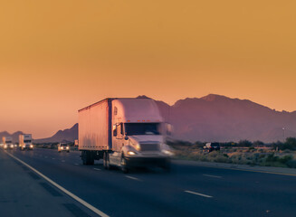 Sunset Highway Journey: Heavy Goods Trucking Through Arizona's Desert