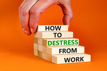Destress from work symbol. Concept words How to destress from work on wooden blocks. Doctor hand. Beautiful orange background. Psychological business and destress from work concept. Copy space.