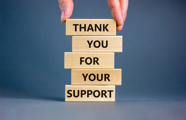 Thank you for support symbol. Concept words Thank you for your support on wooden blocks on a...