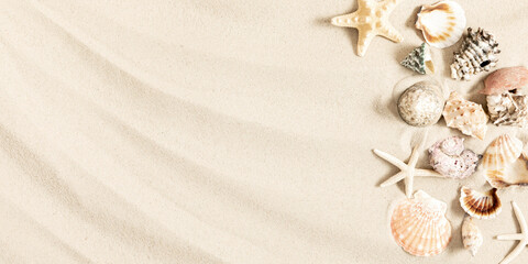 Fototapeta na wymiar Travel and vacation. Vacation season. Summer holiday background. Sand, shells and starfish. Flat lay, top view, copy space. banner