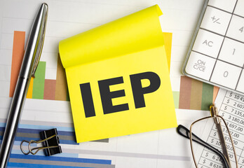 yellow sticker with the text iep and charts