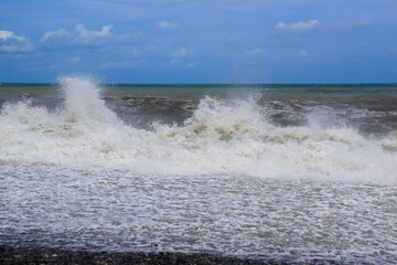 Stormy sea waves breaking near the coast