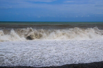 Stormy sea waves breaking near the coast