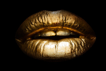 Female golden mouth isolated. Woman sensual gold lips. Gold metal lip.
