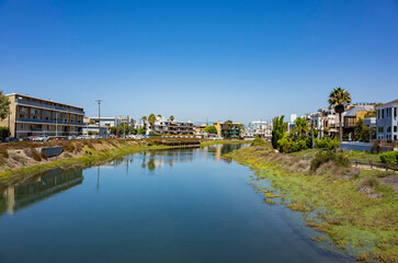 Fototapeta na wymiar Sunny view of the landscape around the Venice Beach Canals