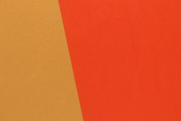 Two color, yellow and orange, textured paper background. Texture with blank space and copy space
