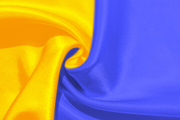 Fabric curved flag of Ukraine, UA. Blue and yellow colors. Close up shot, background. Highly Detailed Wavy Fabric Structure. Fabric curved flag of Ukraine.