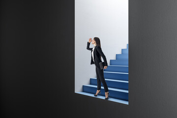 Attractive thoughtful young european businesswoman standing and looking into the distance in abstract concrete wall opening with blue stairs and mock up place. Door, opportunity and success concept.