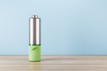Green energy and eco technology concept with silver battery and green leaf on wooden surface and blank light blue wall with place for your logo or text background. 3D rendering, mock up