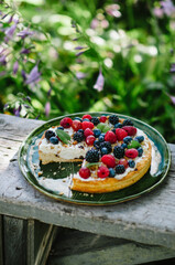 Summer tart with cottage cheese cream with raspberries, blueberries, blackberries, gooseberries.