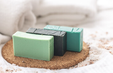 Spa composition with colorful handmade soap close-up.