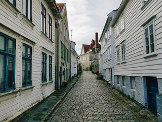 Old well preserved street with city buildings in Stavanger, Norway