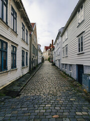 Fototapeta na wymiar Old well preserved street with city buildings in Stavanger, Norway